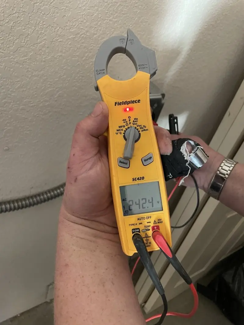 Voltage testing with clamp meter during Generator Installation in San Leandro